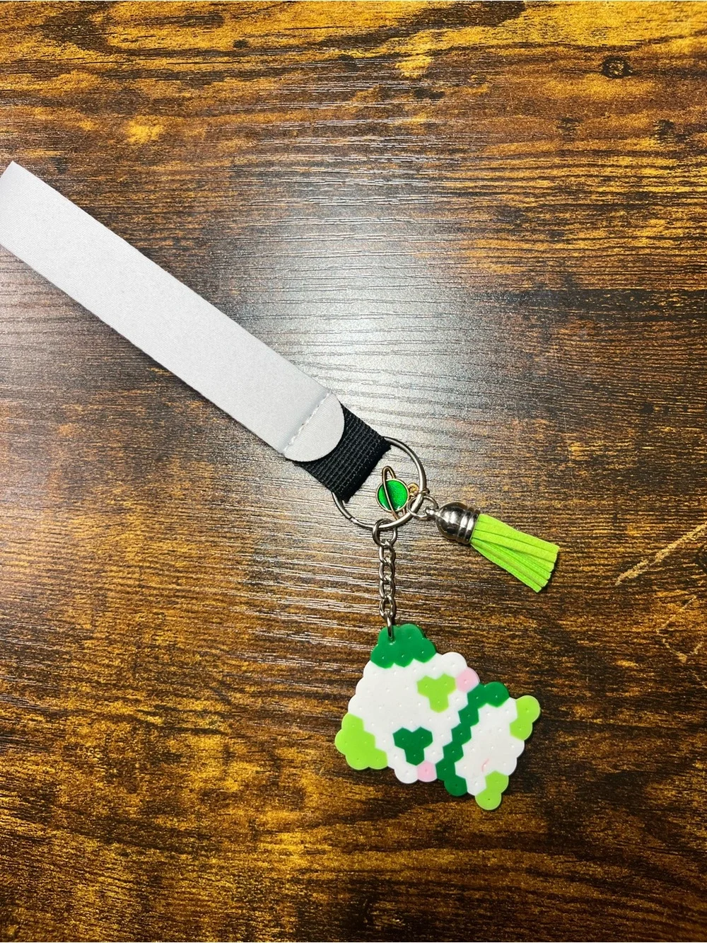 White Lanyard with Green Tassel and Pixel panda - Unbranded